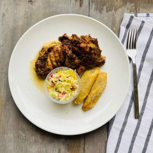 Tangy jerk chicken w/ mango slaw and plantains